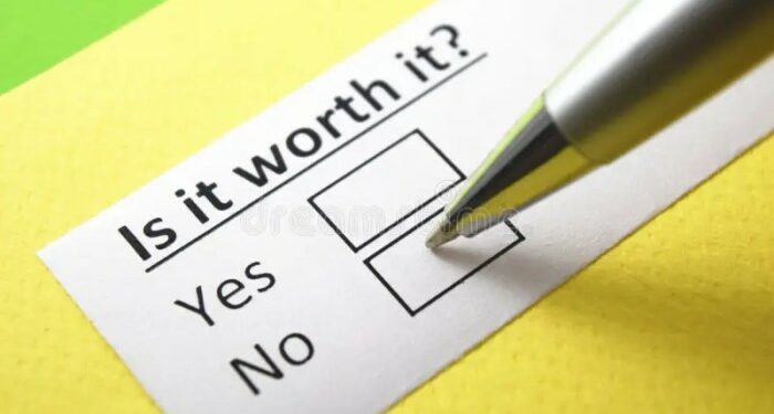 Is it worth it? Yes or no stock image. Image of amount - 241690057